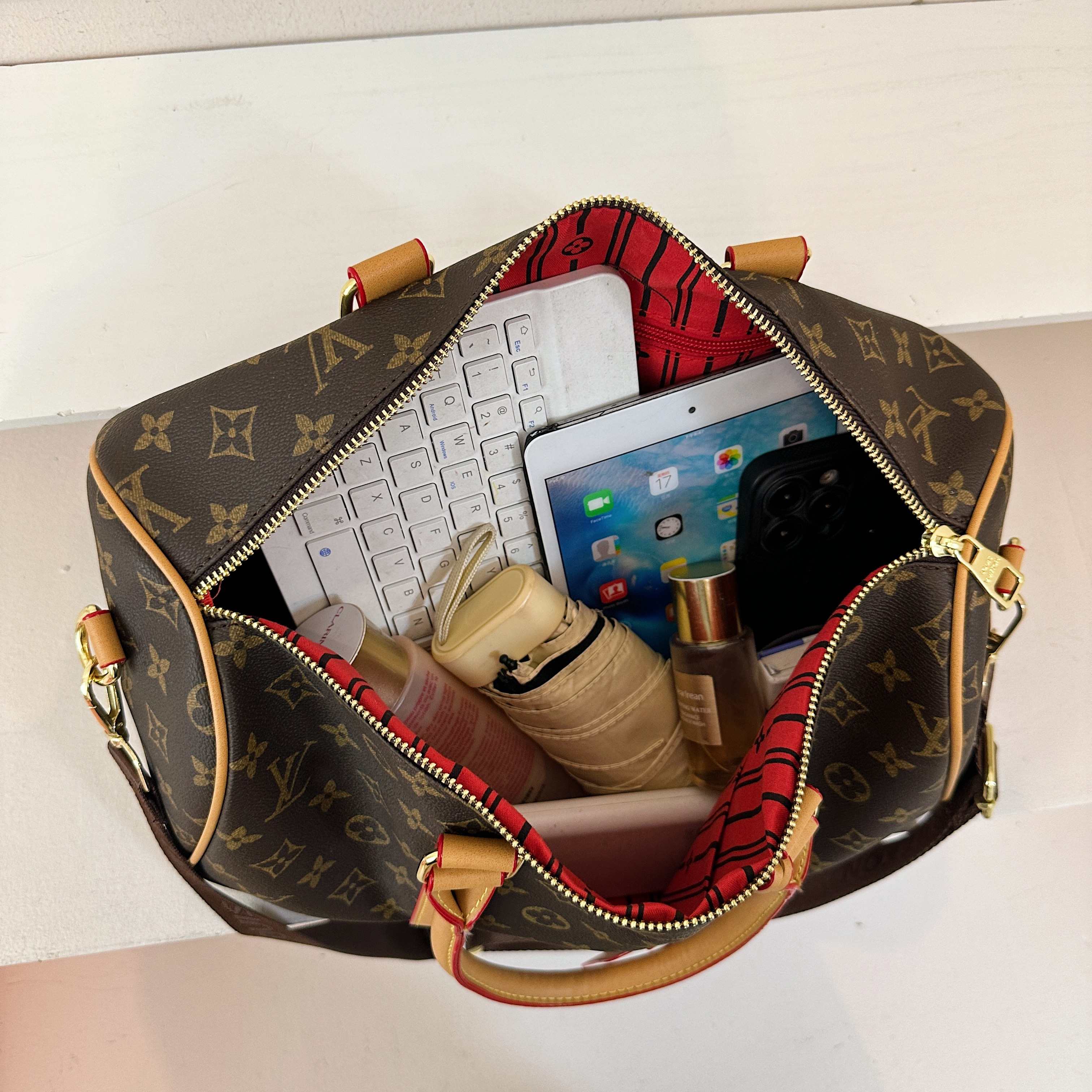 Louis Vuitton Keepall Compact