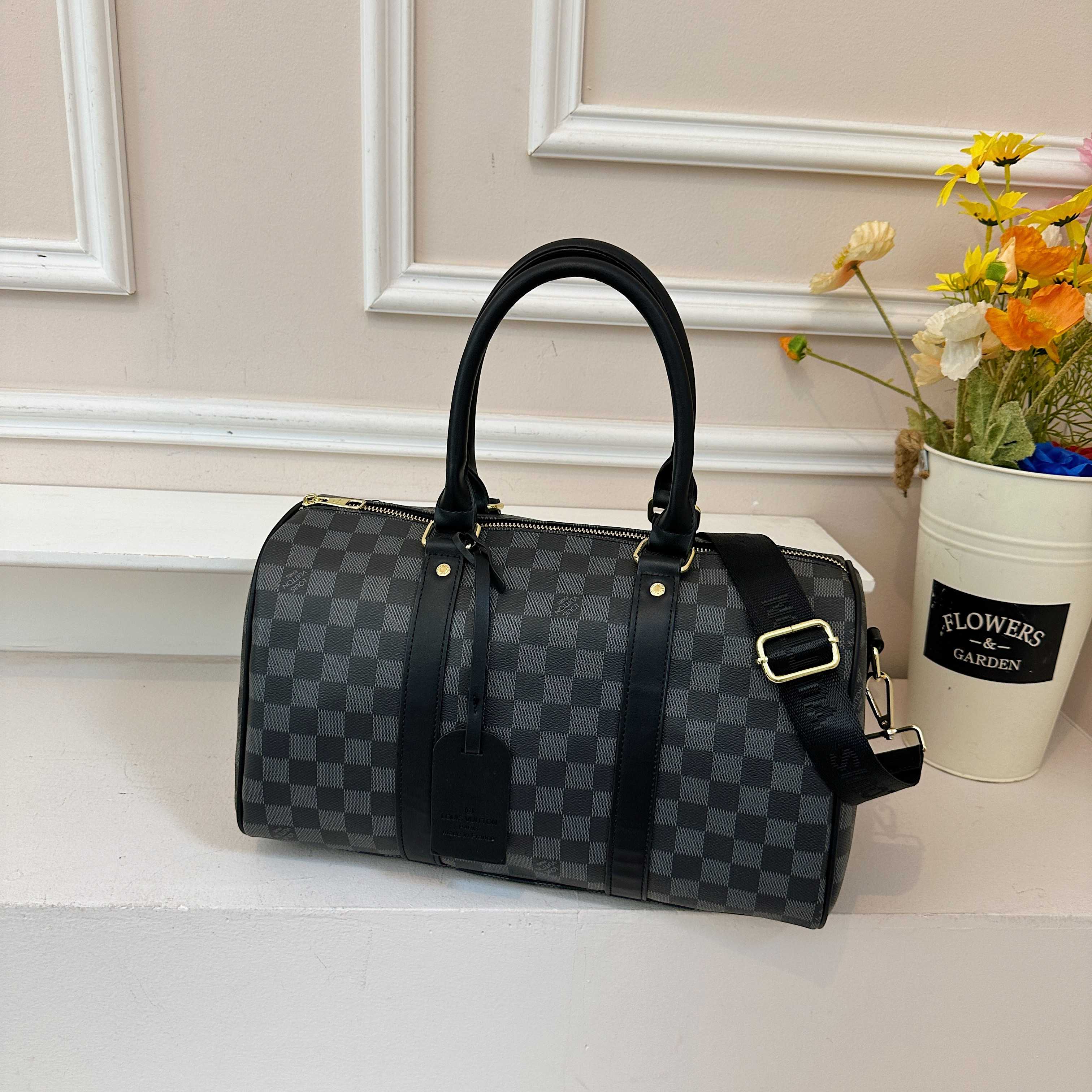 Louis Vuitton Keepall Compact